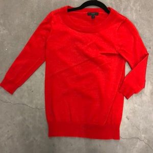 Red JCrew tibbie sweater.